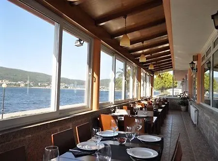 Playa De Quenxe 酒店
