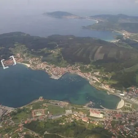 Отель Playa De Quenxe Коркубион